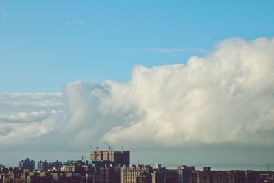 Panoramic view of cityscape against sky