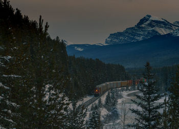 Scenic view of mountains against sky during winter