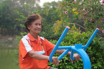 Portrait of woman standing outdoors