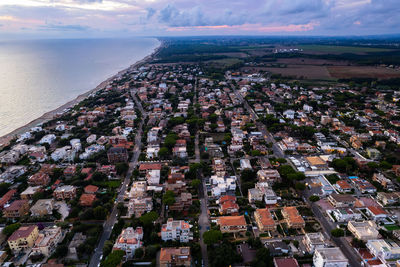 Aerial high angle view of sea  cityscape in lavinio mare, anzio italy 