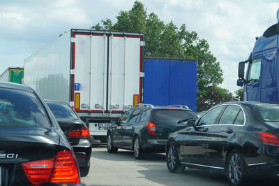 Traffic on road against sky