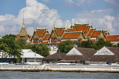 Buildings in city against sky