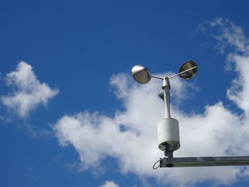 Low angle view of street light against sky