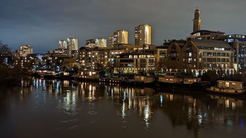 Illuminated buildings in water