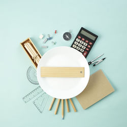 High angle view of telephone booth on table