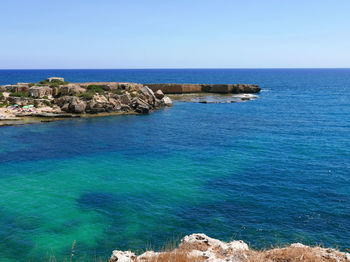 Scenic view of sea against clear sky