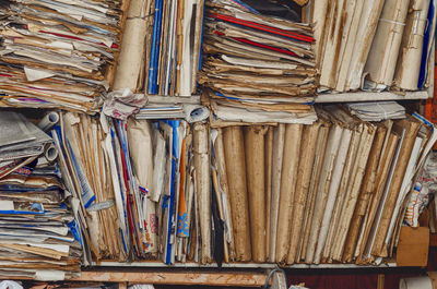 Old paper documents on shelves