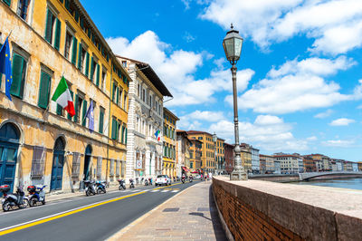 View of lungarno pisa, tuscany, italy of the street along the city's river arno