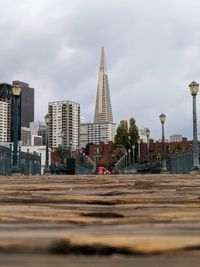 Buildings in city against sky
