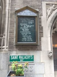 Close-up of text on wall