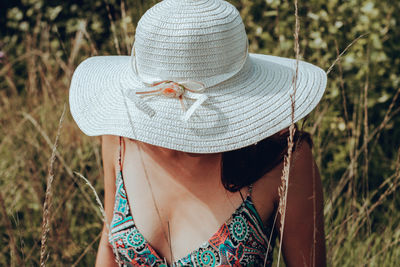 Rear view of woman wearing hat