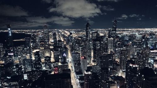 High angle view of illuminated city of chicago by night