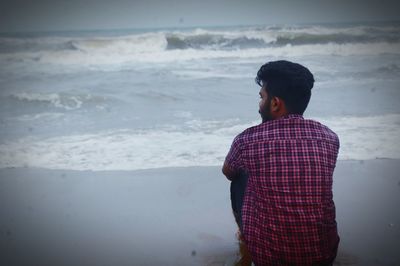 Man looking at sea