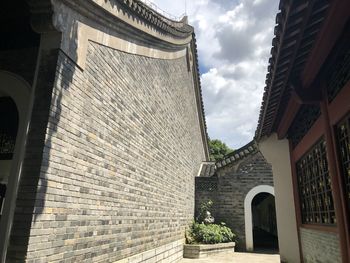 Low angle view of historic building against sky