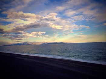 Scenic view of sea against sky at sunset