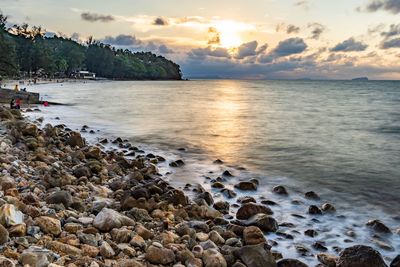 Scenic view of sea against sky during sunset