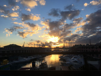 View of harbor at sunset