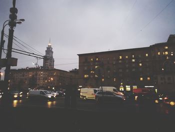 Cars on street in city at night