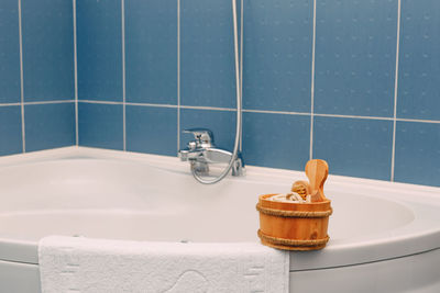 Close-up of faucet in bathroom at home