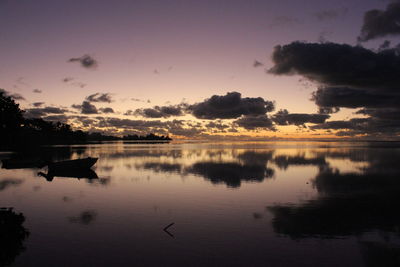 Scenic view of lake at sunset