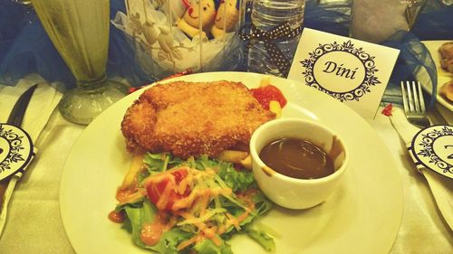 Close-up of served food on table