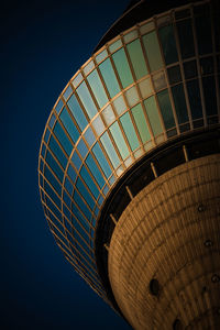 Low angle view of building against blue sky