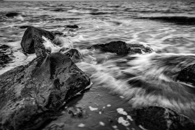 Waves splashing on rocks