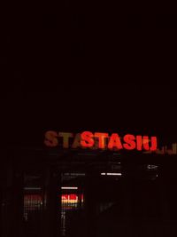 Illuminated sign at night