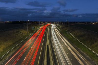 Car light trails in evening blue hour