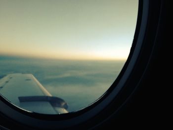 Sunset seen through airplane window