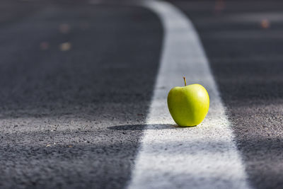 Close-up of apple on leaf