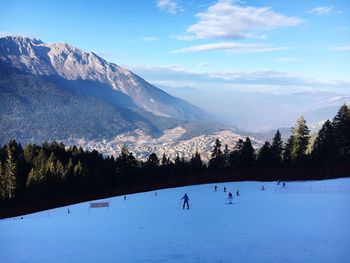 Scenic view of snowcapped mountains against sky