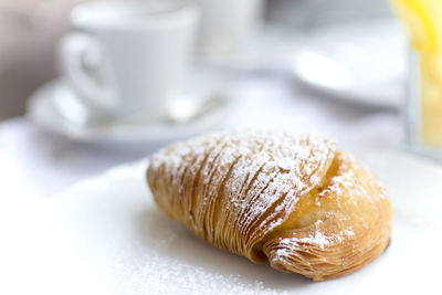 Close-up of sfogliatella in plate on table