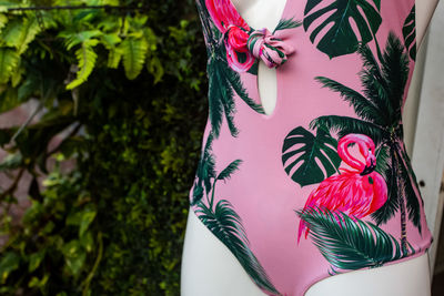 Close-up of pink flowers swimming dress