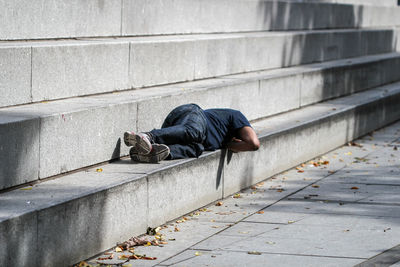 Man sleeping on staircase