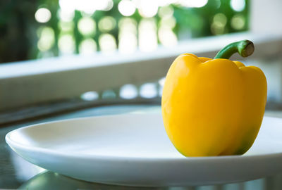 Close-up of yellow juice on table