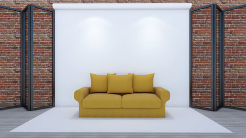 Empty sofa against wall at home