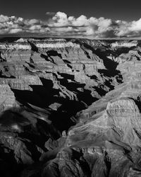 Aerial view of rock formations against sky