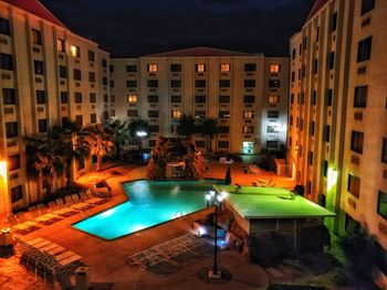 Fountain in swimming pool at night