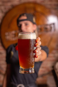 Close-up of beer glass on table