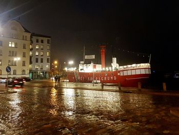 Illuminated ship at night