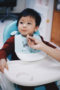 Portrait of cute boy at home