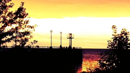 Scenic view of sea at sunset