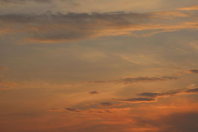 Low angle view of dramatic sky during sunrise