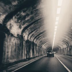 Cars on road in tunnel