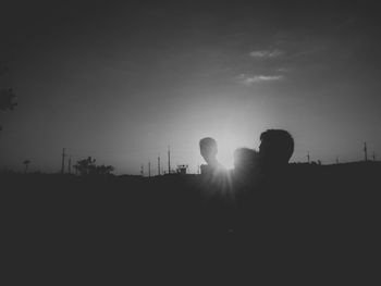 Silhouette of man against sky