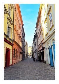 Narrow alley with buildings in background