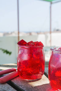 Close-up of gelatin dessert in jars on table