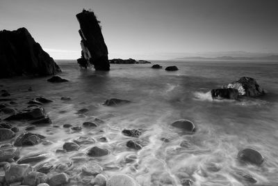 Scenic view of sea against clear sky