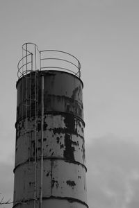 Low angle view of silo against sky